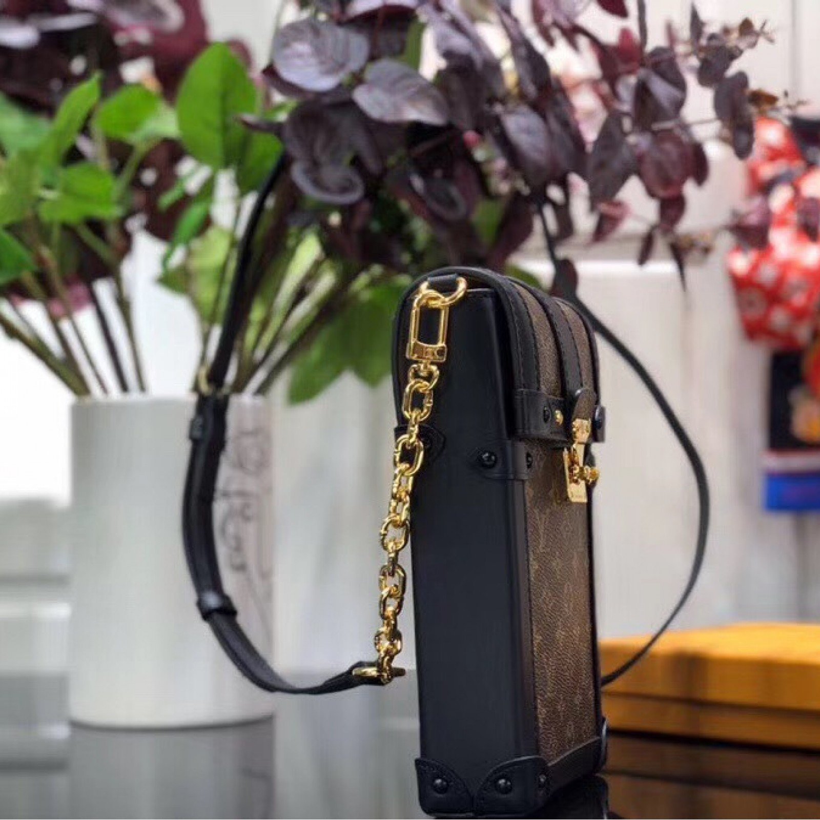 LV VERTICAL TRUNK POCHETTE M63913