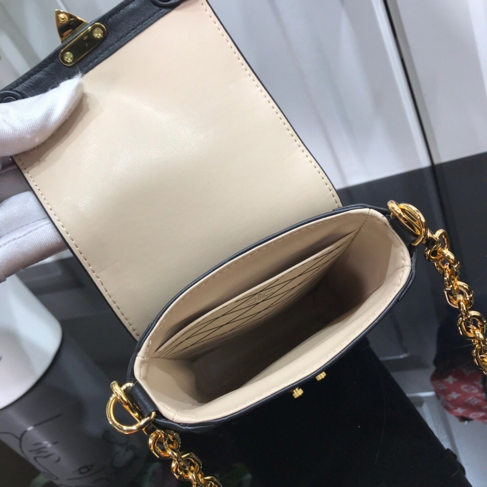 LV VERTICAL TRUNK POCHETTE M67872