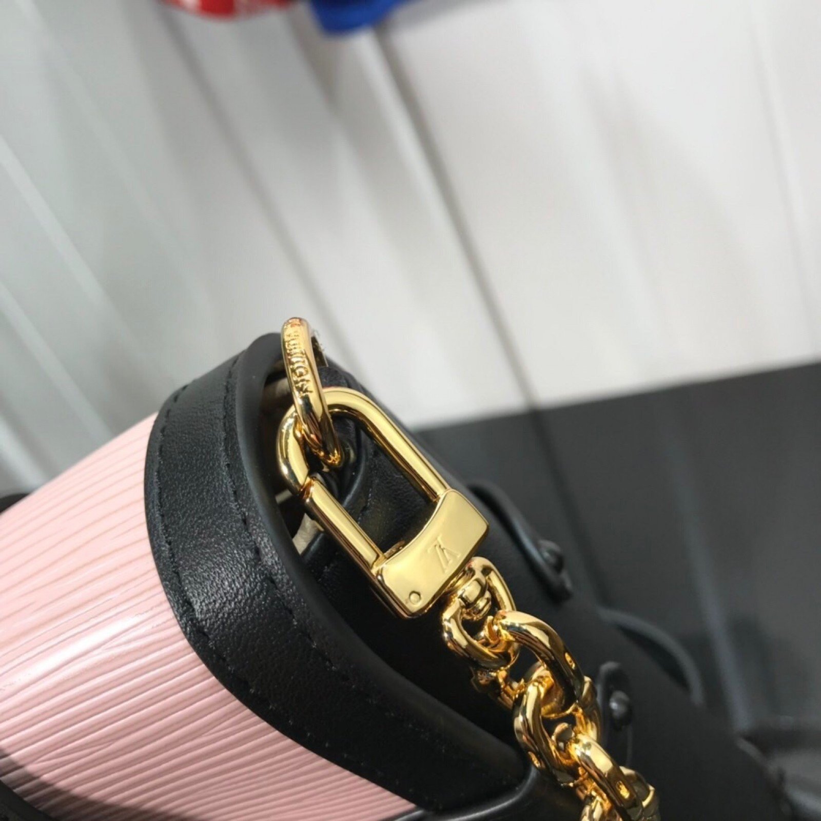 LV VERTICAL TRUNK POCHETTE M67872