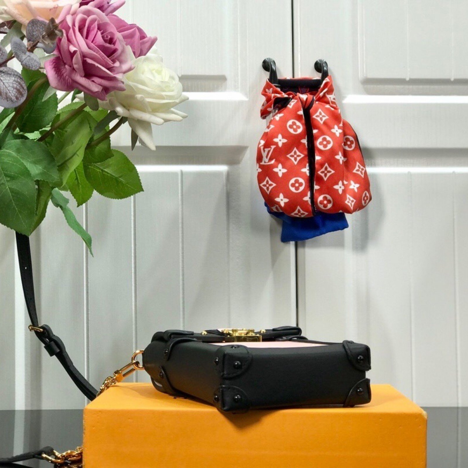 LV VERTICAL TRUNK POCHETTE M67872