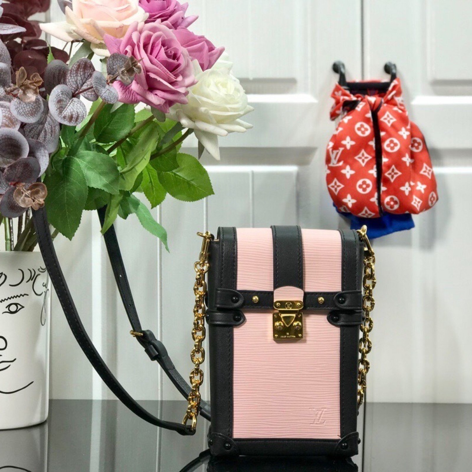 LV VERTICAL TRUNK POCHETTE M67872