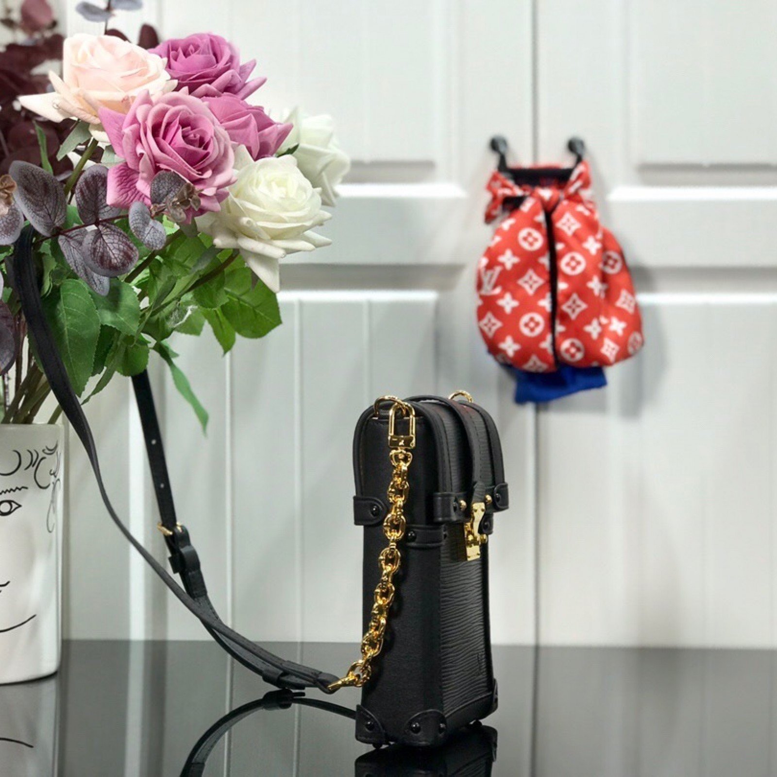 LV VERTICAL TRUNK POCHETTE M67872