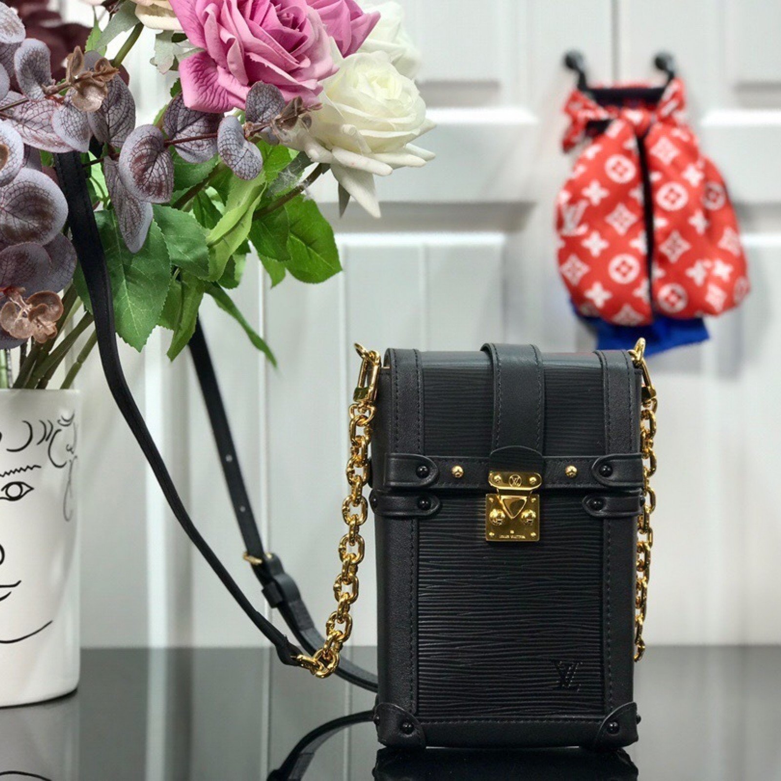 LV VERTICAL TRUNK POCHETTE M67872