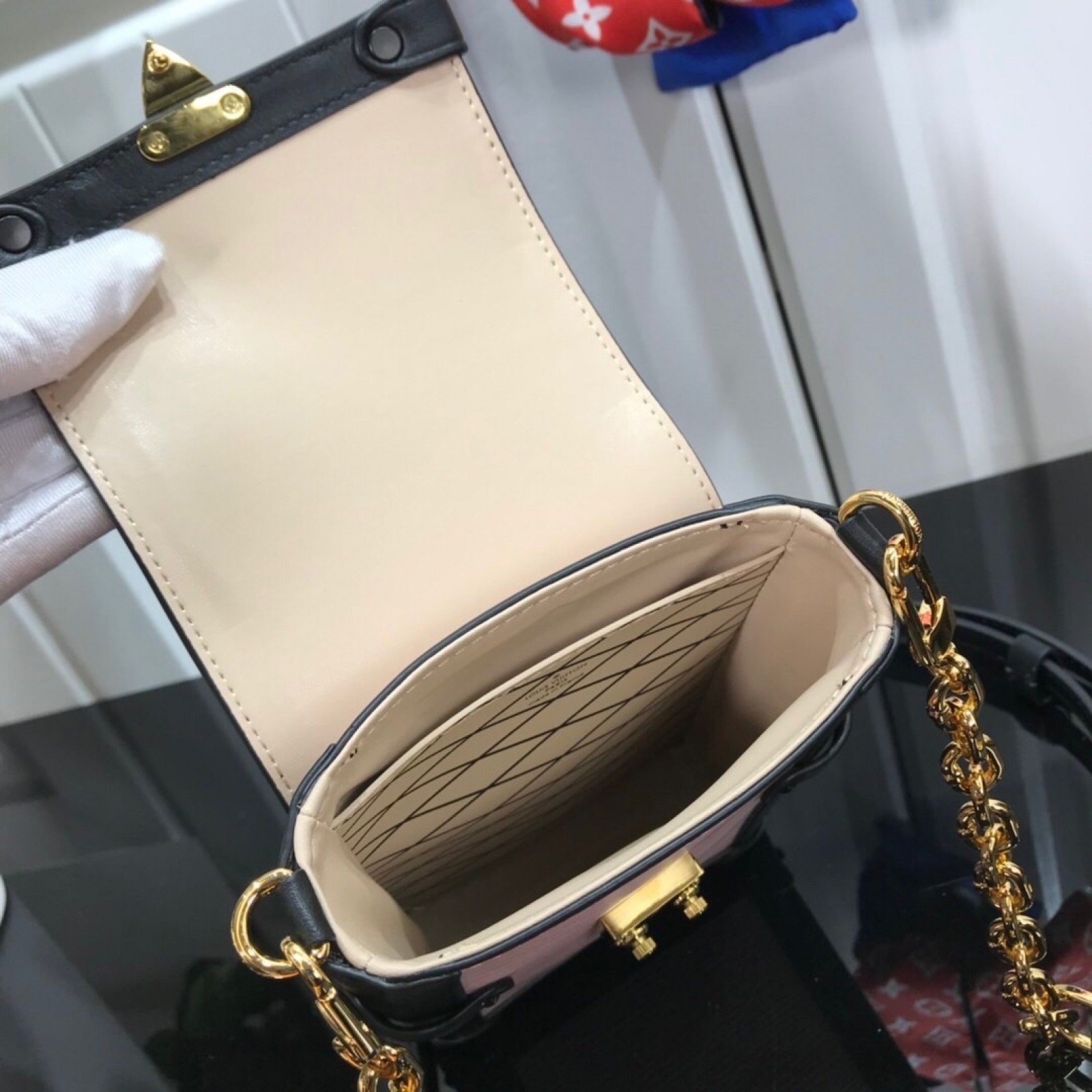 LV VERTICAL TRUNK POCHETTE M67872