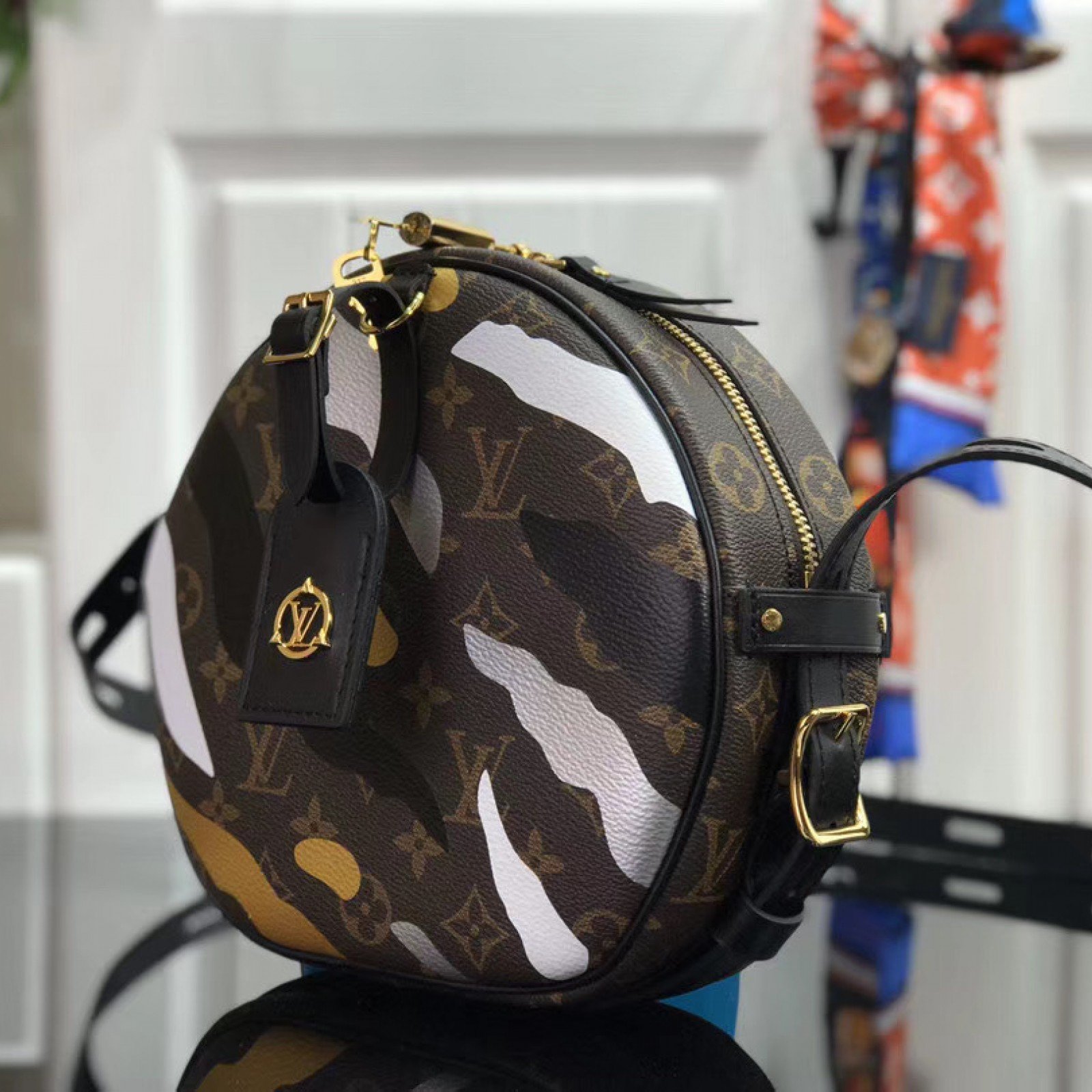 LV XLOL BOITE CHAPEAU SOUPLE M45095
