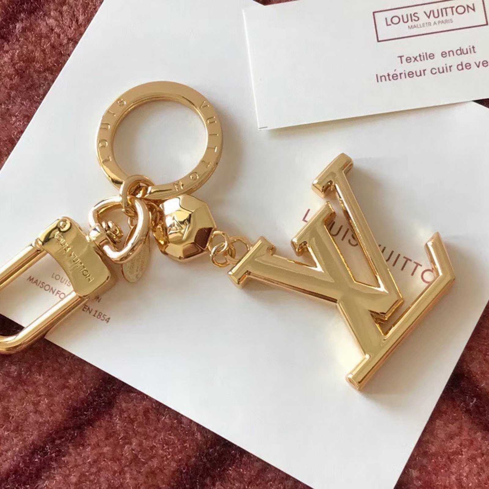 LV FACETTES BAG CHARM AND KEY HOLDER M65216